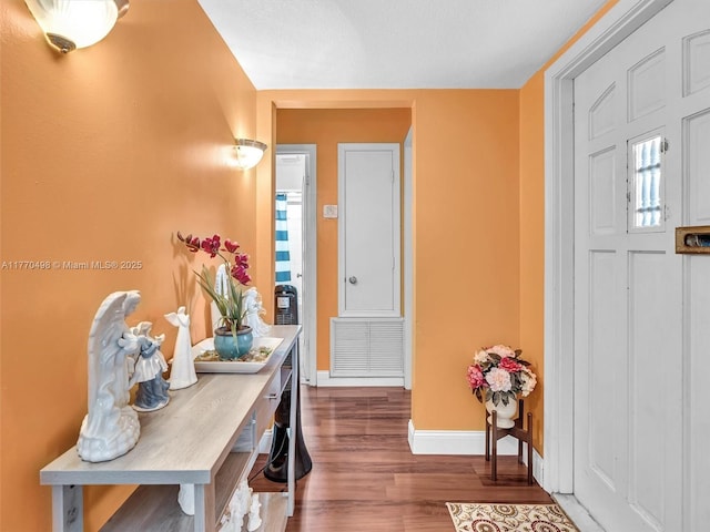 5404 Bayberry Ln, Tamarac, FL 33319 - entryway with wood finished floors and baseboards