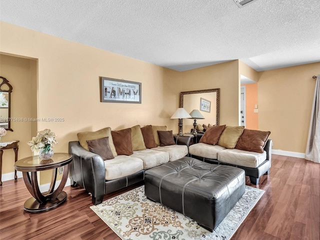 5404 Bayberry Ln, Tamarac, FL 33319 - living room featuring wood finished floors, a textured ceiling, and baseboards