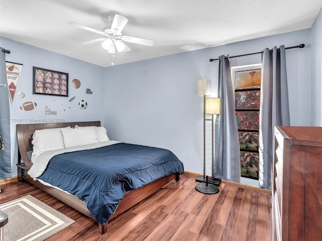 5404 Bayberry Ln, Tamarac, FL 33319 - bedroom featuring wood finished floors, baseboards, ceiling fan, and multiple windows