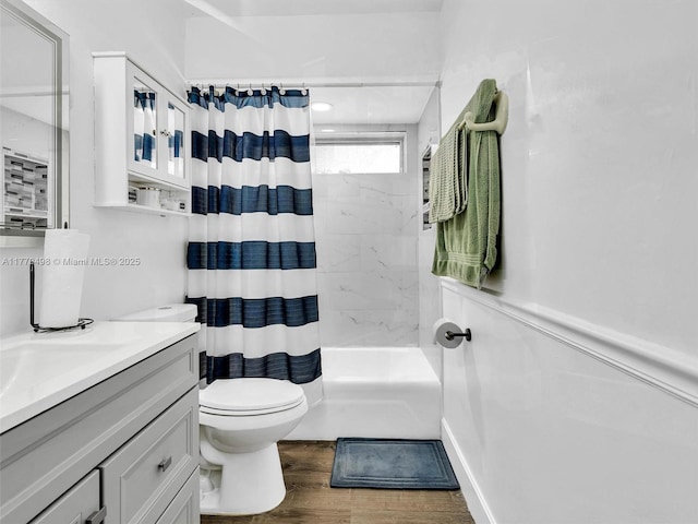 5404 Bayberry Ln, Tamarac, FL 33319 - bathroom featuring vanity, toilet, wood finished floors, and shower / bath combination with curtain