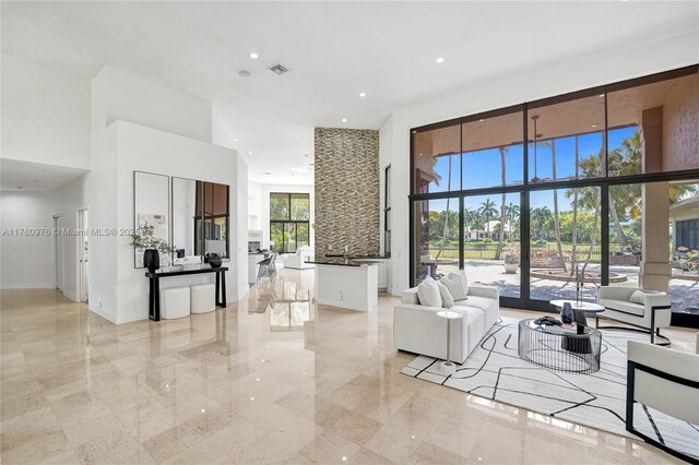3320 Bridle Path Ln, Weston, FL 33331 - living area featuring a high ceiling and recessed lighting