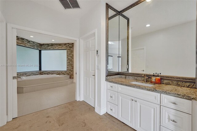 3320 Bridle Path Ln, Weston, FL 33331 - full bathroom featuring a garden tub, vanity, and recessed lighting