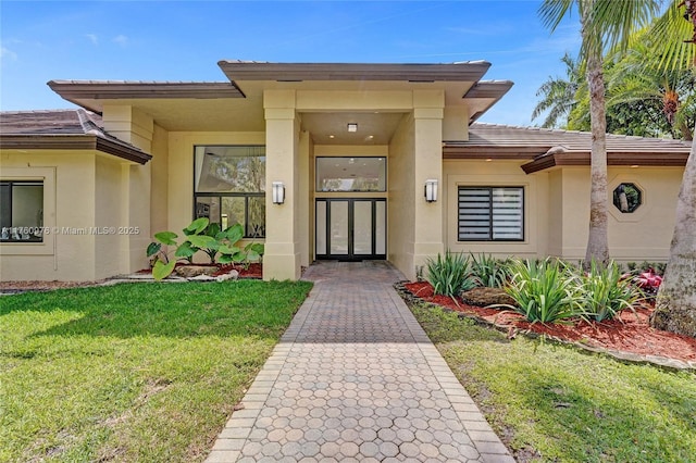 3320 Bridle Path Ln, Weston, FL 33331 - doorway to property featuring stucco siding, a yard, french doors, and a tiled roof