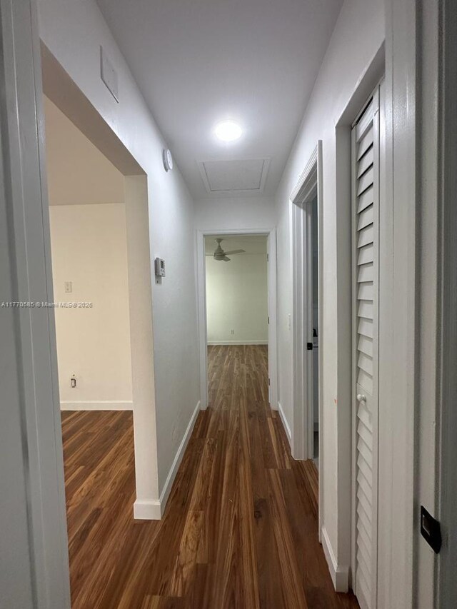 1538 NE 5th Ave, Fort Lauderdale, FL 33304 - hall with dark wood-style floors and baseboards