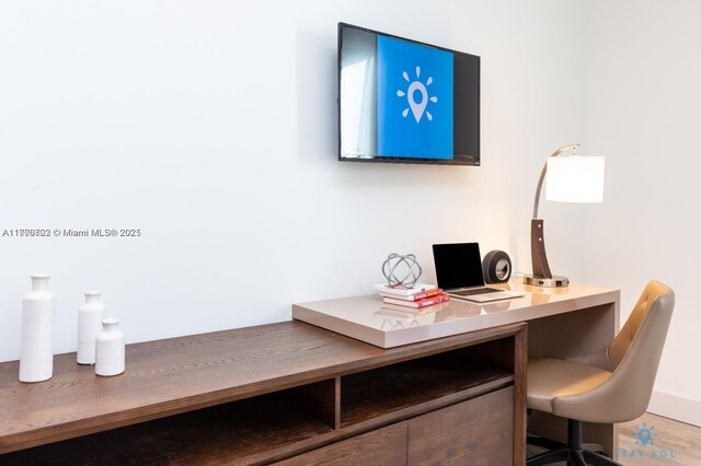 office area with wood finished floors