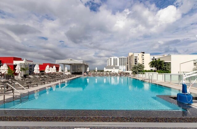 pool featuring a patio area