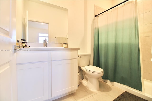 full bath featuring a shower with curtain, tile patterned floors, toilet, and vanity