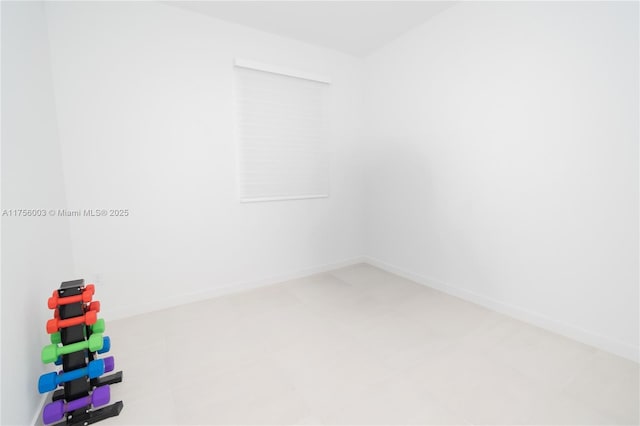 empty room with baseboards