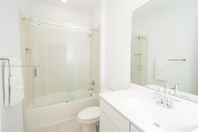 bathroom featuring enclosed tub / shower combo, toilet, tile patterned flooring, and vanity