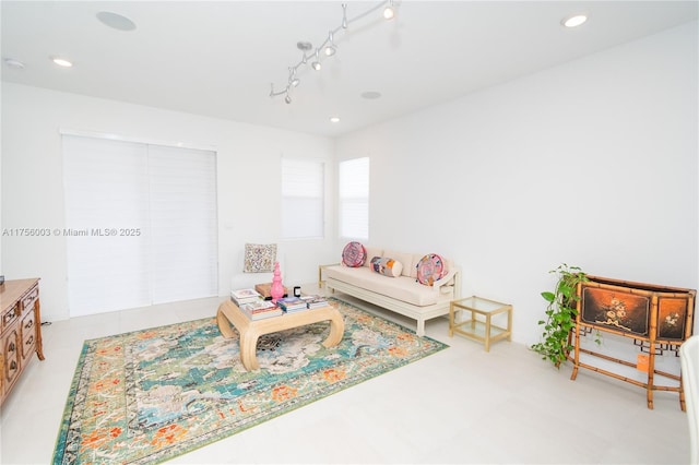 living area with track lighting and recessed lighting