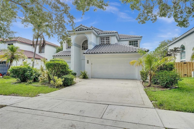 2791 La Paz Ave, Cooper City, FL 33026 - mediterranean / spanish house featuring a tile roof, driveway, stucco siding, and a garage