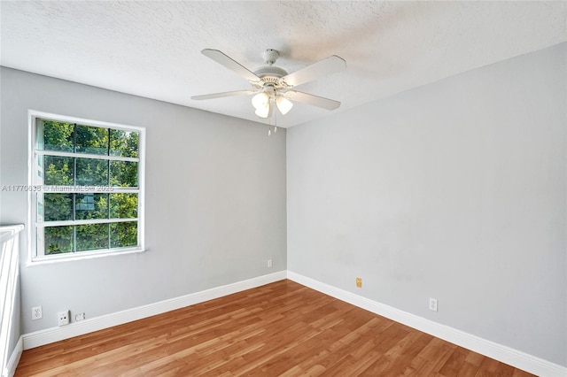 2791 La Paz Ave, Cooper City, FL 33026 - spare room with light wood finished floors, a ceiling fan, and a textured ceiling