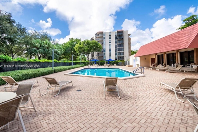 3301 N Country Club Dr Unit 110, Aventura, FL 33180 - pool with a patio area and fence