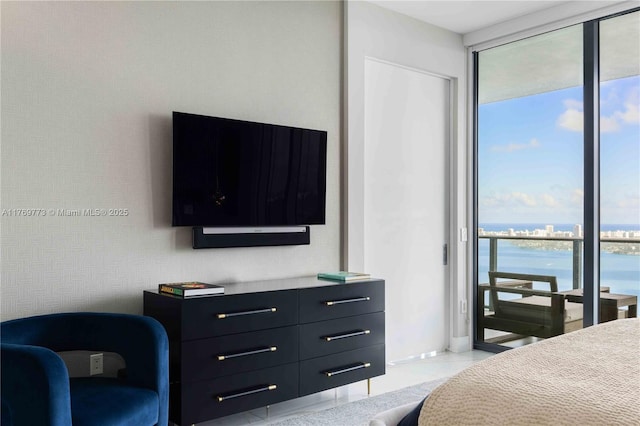 650 NE 32nd St Unit Ph5004, Miami, FL 33137 - bedroom with multiple windows, a wall of windows, and tile patterned flooring