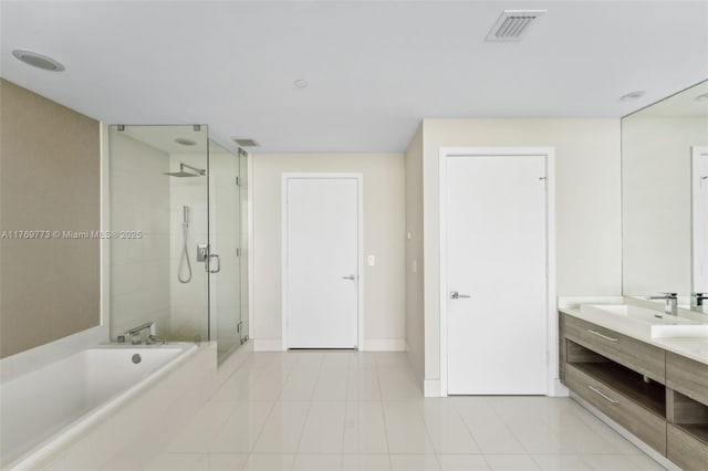 650 NE 32nd St Unit Ph5004, Miami, FL 33137 - bathroom with a garden tub, a shower stall, tile patterned flooring, vanity, and baseboards