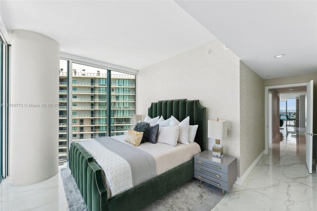 650 NE 32nd St Unit Ph5004, Miami, FL 33137 - bedroom with marble tiled flooring and baseboards