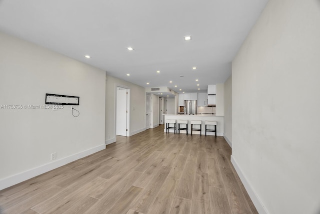 1901 Brickell Ave Unit B2304, Miami, FL 33129 - living room featuring light wood-type flooring and recessed lighting