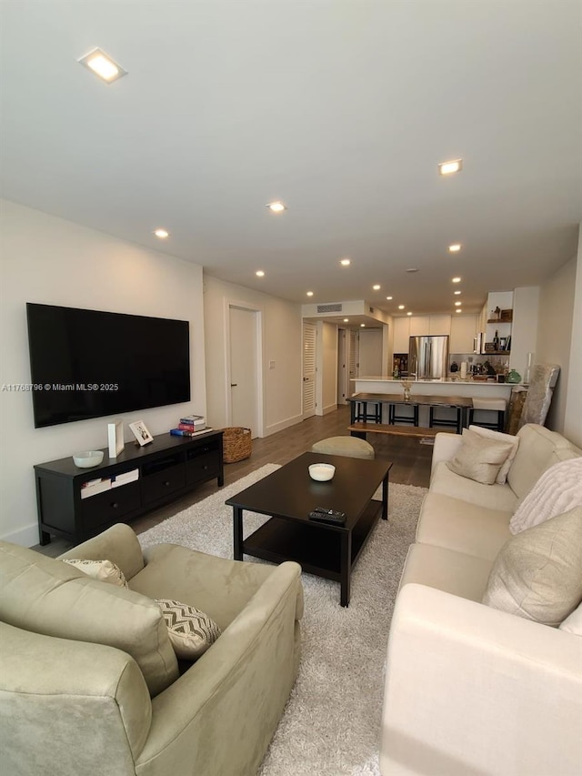 1901 Brickell Ave Unit B2304, Miami, FL 33129 - living room with baseboards and recessed lighting