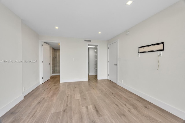 1901 Brickell Ave Unit B2304, Miami, FL 33129 - spare room with light wood-style flooring and recessed lighting