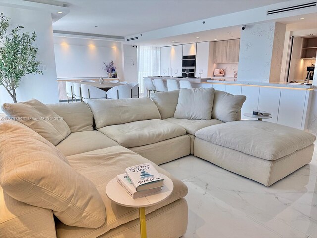 19707 Turnberry Way Unit 6E, Aventura, FL 33180 - living room featuring marble finish floor, visible vents, and recessed lighting