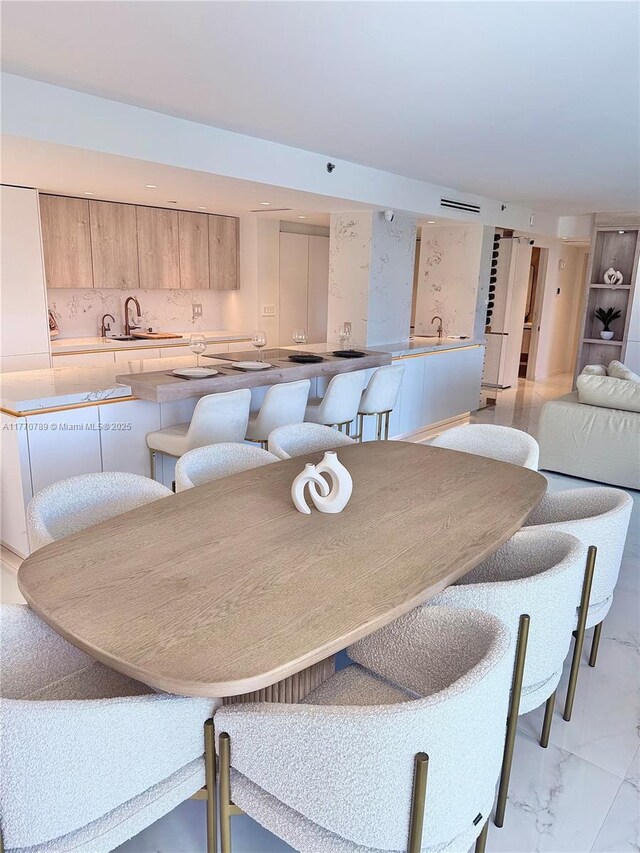 19707 Turnberry Way Unit 6E, Aventura, FL 33180 - dining area featuring marble finish floor and visible vents