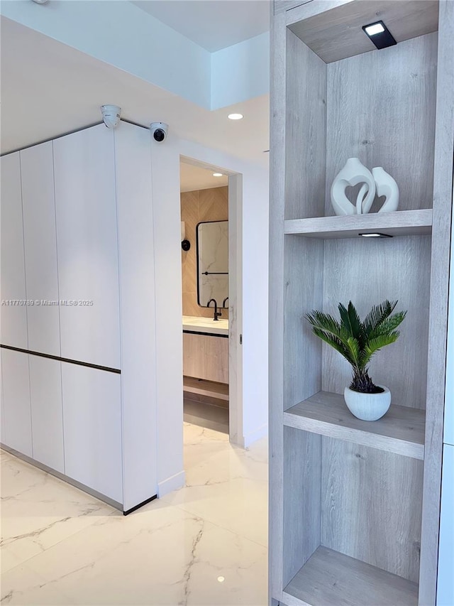 19707 Turnberry Way Unit 6E, Aventura, FL 33180 - bathroom with marble finish floor, vanity, and recessed lighting