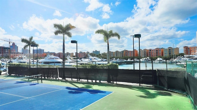 19707 Turnberry Way Unit 6E, Aventura, FL 33180 - view of sport court with fence and a view of city