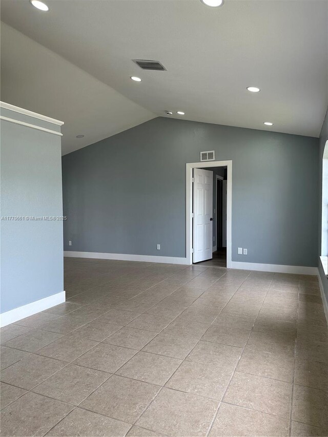 1715 NE 2nd Ave, Cape Coral, FL 33909 - unfurnished room featuring lofted ceiling, baseboards, and recessed lighting