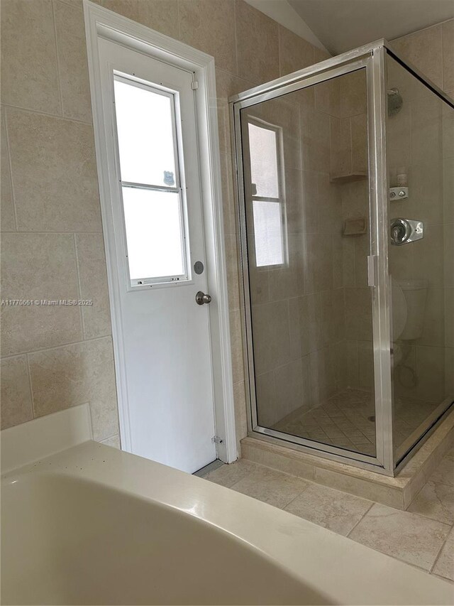 1715 NE 2nd Ave, Cape Coral, FL 33909 - bathroom featuring a shower stall