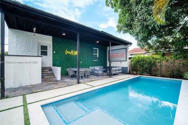 1114 SW 11th Ave, Miami, FL 33129 - view of pool with a patio area, outdoor lounge area, and entry steps