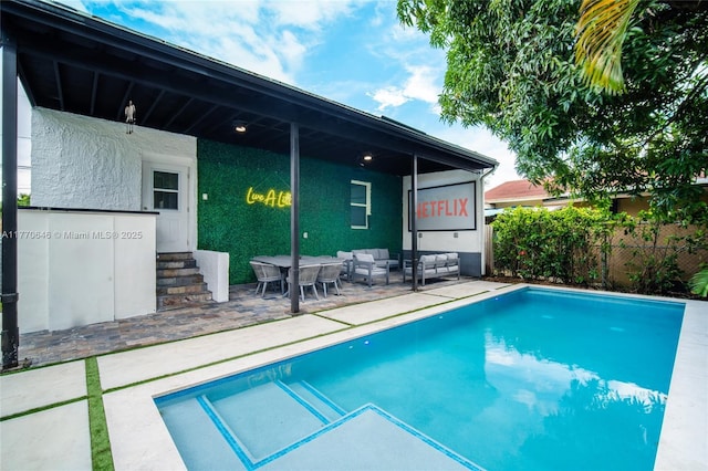 1114 SW 11th Ave, Miami, FL 33129 - view of pool featuring outdoor lounge area, a patio, and entry steps