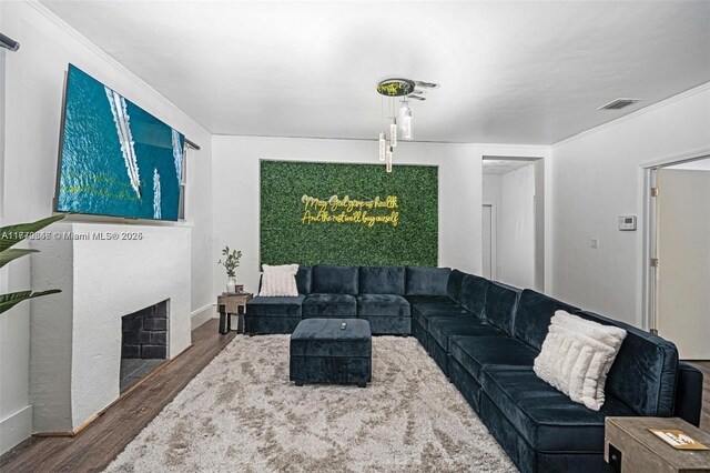 1114 SW 11th Ave, Miami, FL 33129 - living room featuring wood finished floors and a fireplace