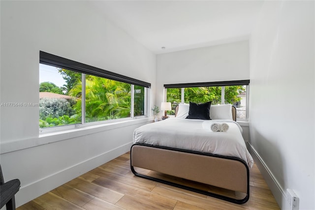 1114 SW 11th Ave, Miami, FL 33129 - bedroom featuring wood finished floors and baseboards