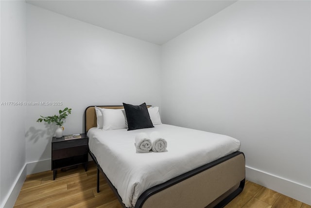 1114 SW 11th Ave, Miami, FL 33129 - bedroom featuring wood finished floors and baseboards
