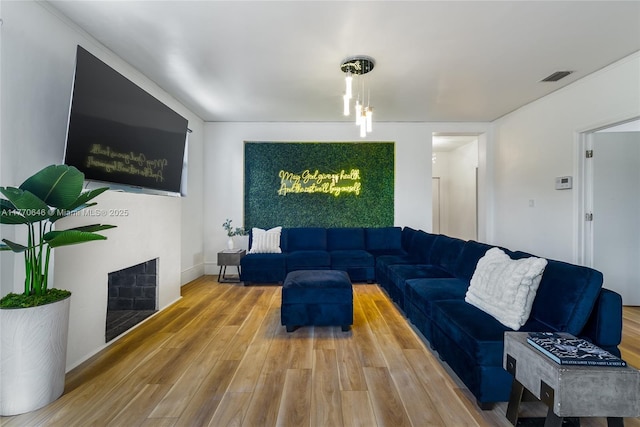 1114 SW 11th Ave, Miami, FL 33129 - living room with wood finished floors and a fireplace