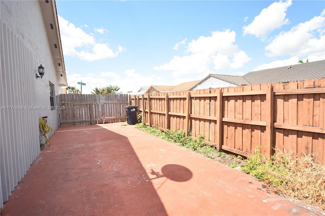 view of patio featuring a fenced backyard