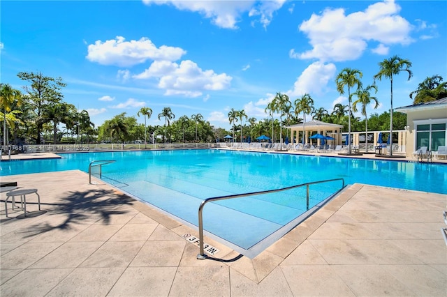 374 NE 27th Ave Unit 203, Homestead, FL 33033 - community pool with a gazebo, a patio, and fence