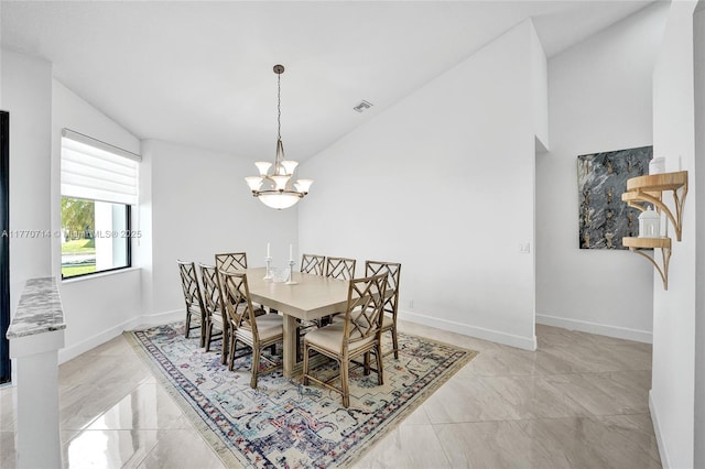 2649 Nelson Ct, Weston, FL 33332 - dining area with a chandelier, marble finish flooring, and vaulted ceiling