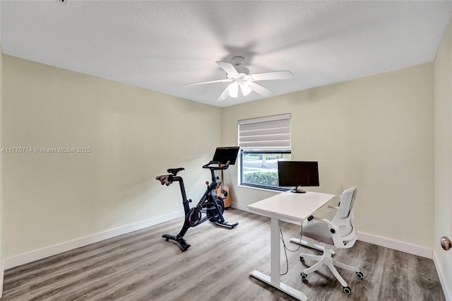 2649 Nelson Ct, Weston, FL 33332 - home office with ceiling fan, wood finished floors, and a textured ceiling