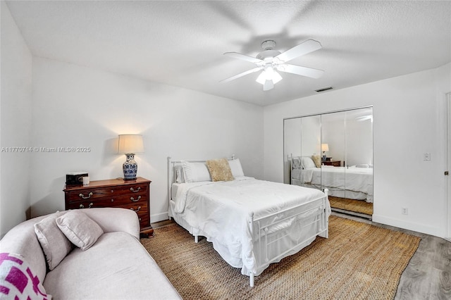 2649 Nelson Ct, Weston, FL 33332 - bedroom featuring wood finished floors, a closet, and ceiling fan