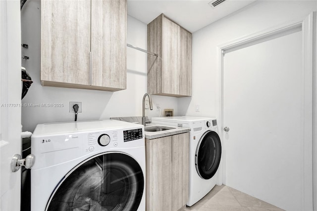 2649 Nelson Ct, Weston, FL 33332 - laundry room with washer and clothes dryer and cabinet space
