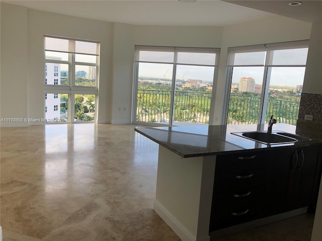 20000 E Country Club Dr Unit Ts02, Aventura, FL 33180 - kitchen with a view of city, open floor plan, baseboards, and dark stone countertops