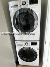 20000 E Country Club Dr Unit Ts02, Aventura, FL 33180 - clothes washing area featuring laundry area and stacked washer and clothes dryer