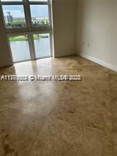 20000 E Country Club Dr Unit Ts02, Aventura, FL 33180 - unfurnished room featuring baseboards