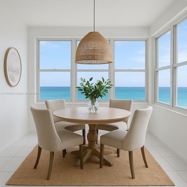 5255 Collins Ave Unit 5D, Miami Beach, FL 33140 - dining space with light tile patterned floors and a water view