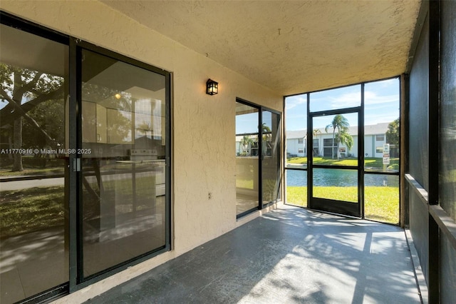 1111 Adams Ave Unit 1111B, Homestead, FL 33034 - unfurnished sunroom featuring a water view