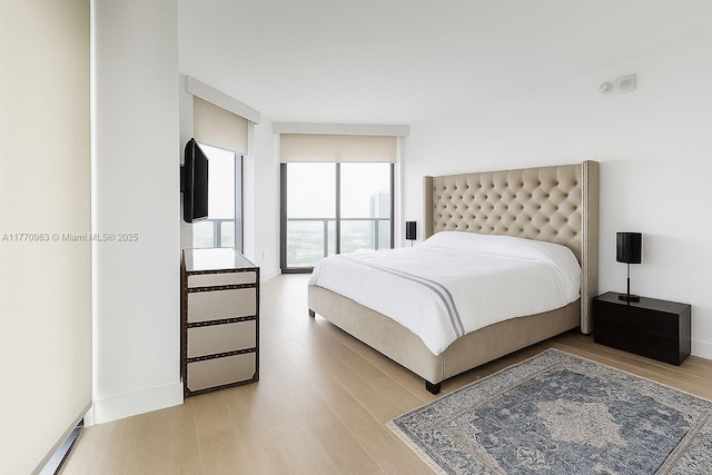 501 NE 31st St Unit 2710, Miami, FL 33137 - bedroom with light wood-type flooring
