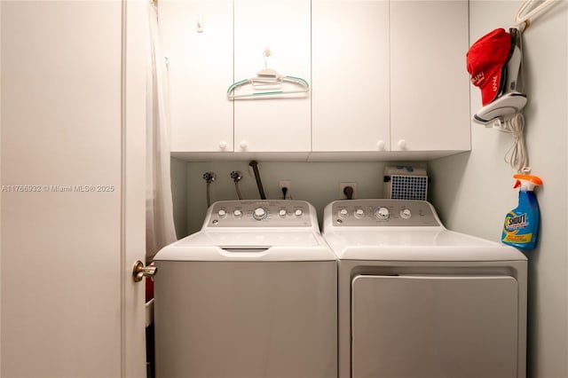 10140 W Bay Harbor Dr Unit 502B, Bay Harbor Islands, FL 33154 - laundry area featuring cabinet space and washer and clothes dryer