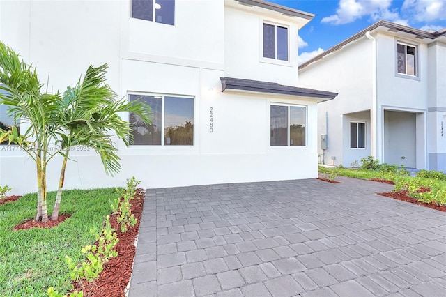 exterior space with stucco siding