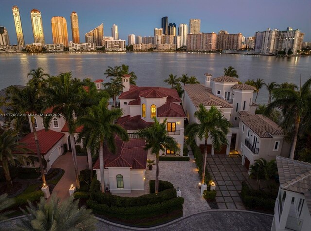 3918 Island Estates Dr, Aventura, FL 33160 - drone / aerial view featuring a city view and a water view